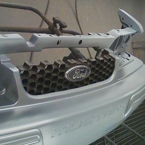 I customized the stock grille opening by adding this section of an Escape grille