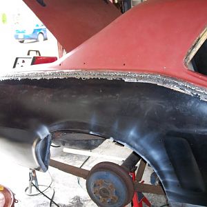 Welding complete on r/s quarter skin.