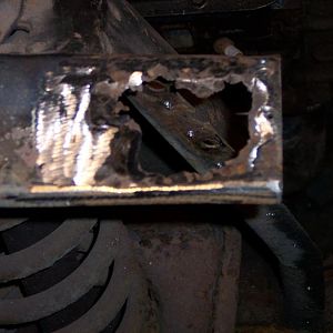 Rotted section in the r/s front shock tower upper flange.