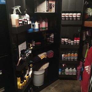 Cabinet loaded up with products n' stuff