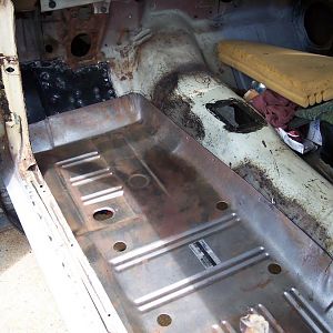 7/31/16 Welded in the l/s toe board patch & drilled the spot weld holes in the l/s long floor pan did another test fit.