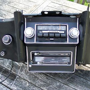 8/2/16 I had to modify the factory radio mounting bracket to fit the 80's era AM/FM stereo radio.