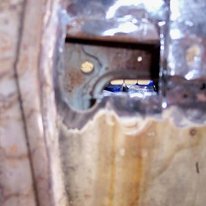8/17/16 Cut out rust through spot & prepped for patches.