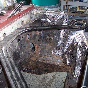 9/10/16 Finished removing the old black paint from the engine side of the l/s shock tower, rear inner fender panel, & both frame rails.