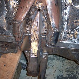 10/01/16 Welded on the r/s rear big block shock tower reinforcement, & the 2 center frame to shock tower reinforcements.