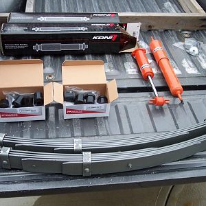 2/11/17 New mid-eye 1" drop rear leaf springs, dual exhaust shackles, & front & rear Koni STR.T shocks.