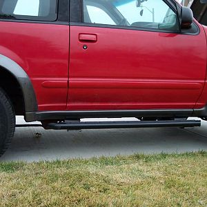 Lower rocker panel molding & new side step installed.
