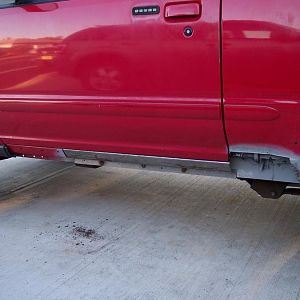 Lower rocker panel welded in & lower quarter rust cut out.