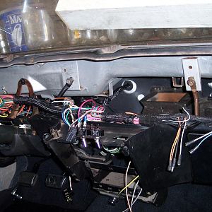 12/24/17 Wrapped more of the under dash harness, & secured the turn signal wires under the dash & installed the steering column cover.