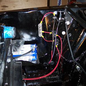 1/10/18 Solenoid wires come back into the engine compartment through the r/s front inner fender panel below the starter solenoid.