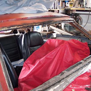 5/12/18 Finished removing the front windshield. Found a couple rust holes under the sealer that will have to be repaired.