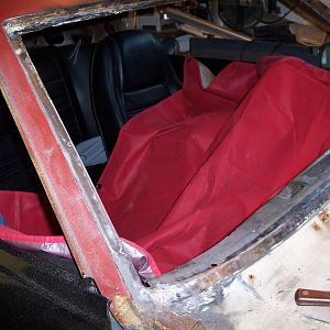 5/26/18 Started cleaning the front windshield channel of the remaining sealer.