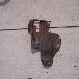 7/29/18 Old metal charcoal canister bracket 1/2 rusted away.
