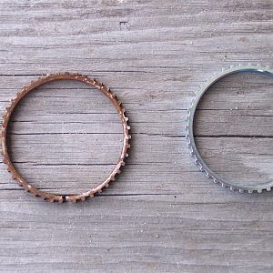 ABS tone rings, new one on the right, & the cracked one on the left.