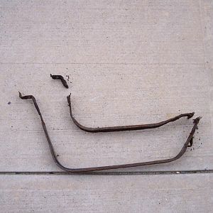 Old gas tank straps, the one on the top is off the r/s of the gas tank.