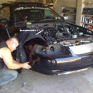 my bro donny helpin with the removal of the front bumper.